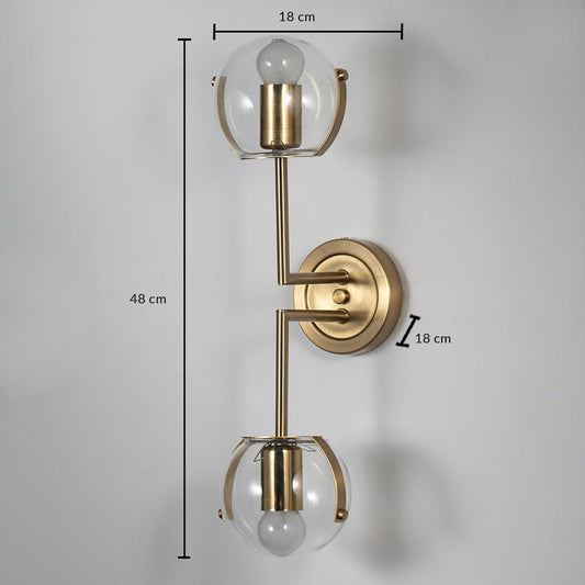 Gold metal wall light with clear glass shades showing dimensions approx 45 cm height 15 cm width suitable for luxury interior walls.