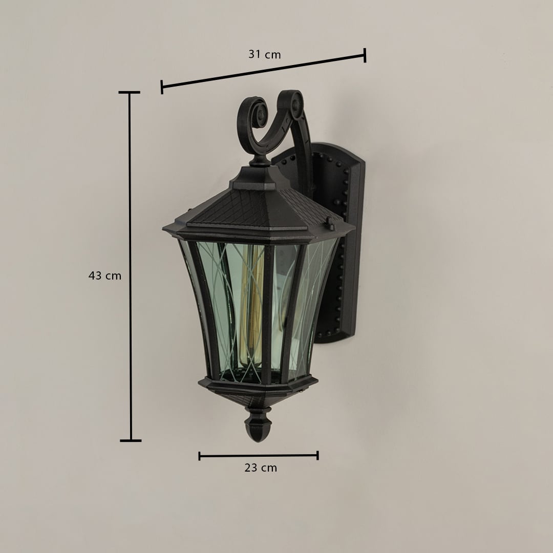 Black metal outdoor lantern with textured glass shown with 43 cm height 31 cm width and 23 cm depth providing accurate exterior fitting details.