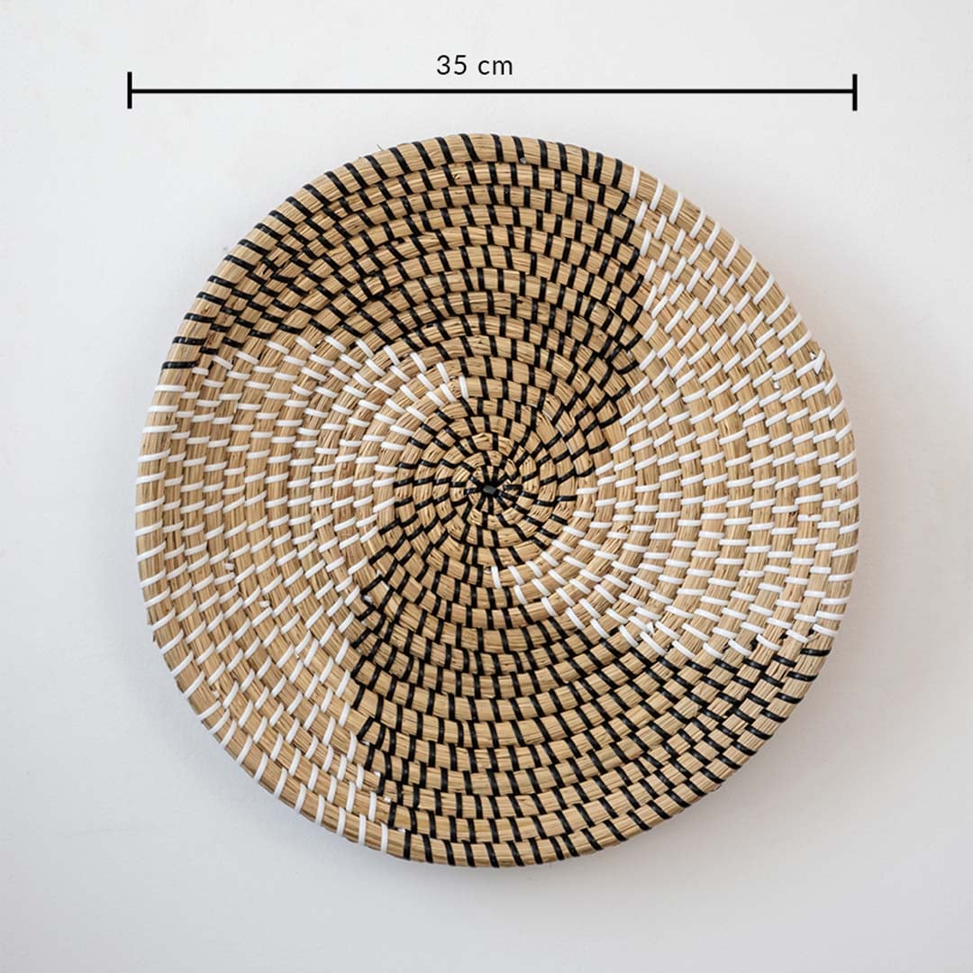 Circular handwoven wall basket with spiral pattern in natural tones showing 30 cm diameter for decorative wall styling.