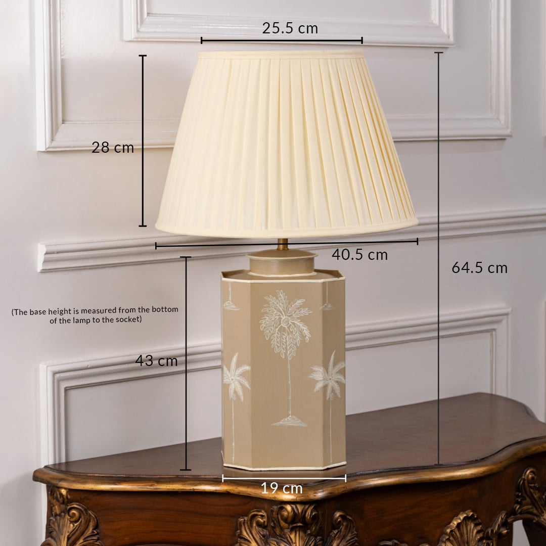 Palm tree table lamp with pleated cream shade measuring 64.5 cm total height 43 cm base height 25.5 cm top width 19 cm base width and 40.5 cm overall width perfect for decorative lighting.
