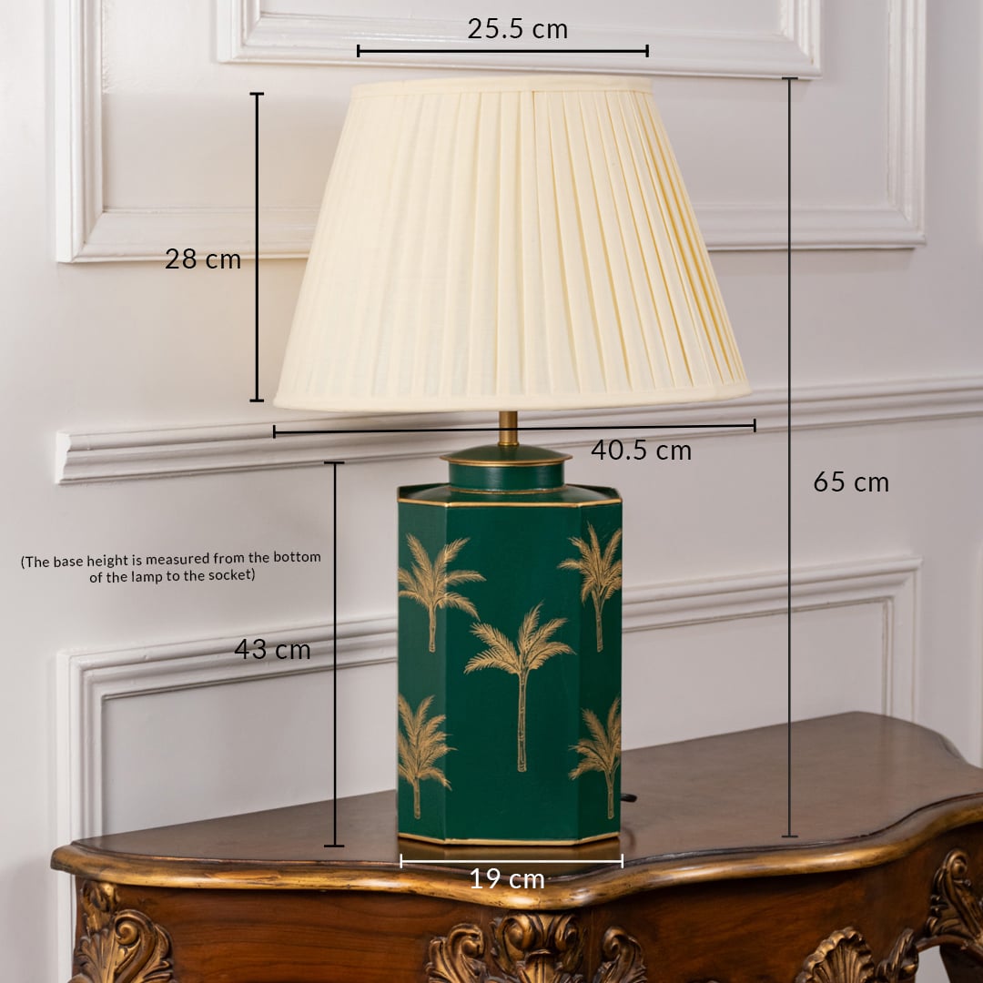 Green palm table lamp with pleated cream shade measuring 65 cm height 43 cm base height 25.5 cm top width 19 cm base width and 40.5 cm overall width perfect for statement lighting.