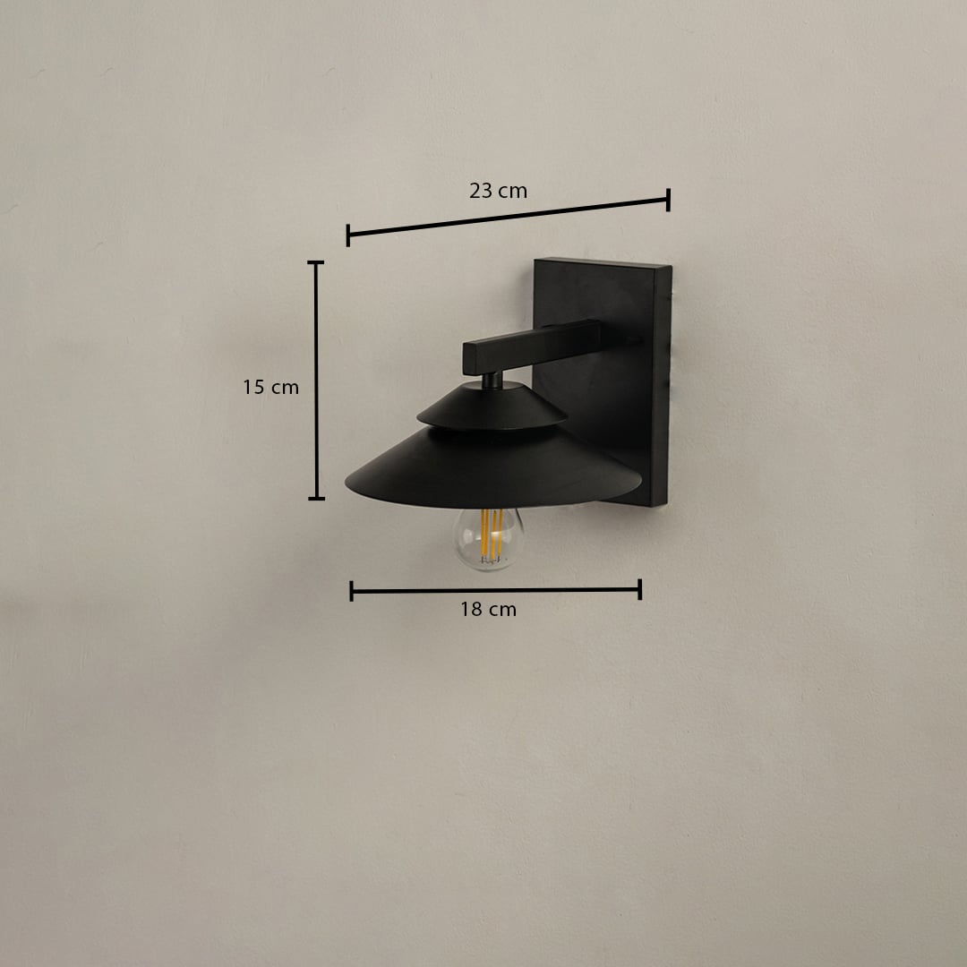 Black metal wall light with size details showing 15 cm height 23 cm depth and 18 cm width displayed clearly on a plain background.