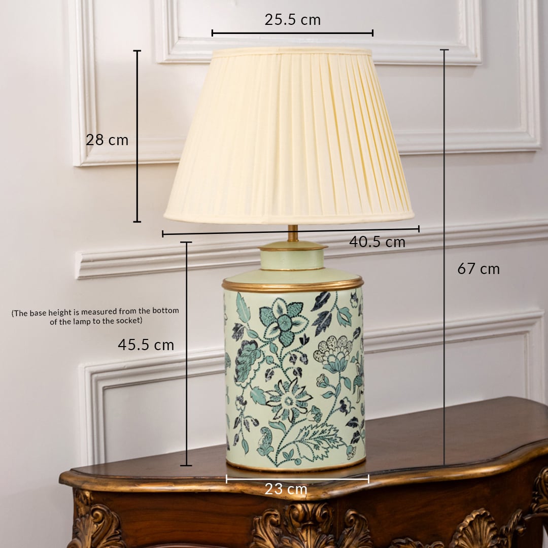 Mint green floral ceramic table lamp with cream pleated shade shown 67 cm tall ideal for bedside or console decor.