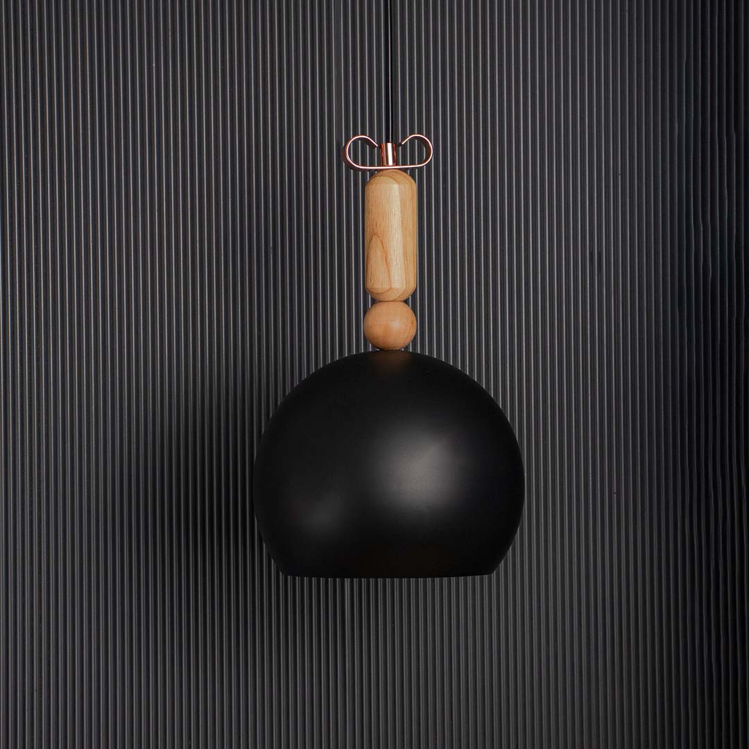 Contemporary black dome pendant lamp with wooden accent displayed off on black background for stylish interiors.