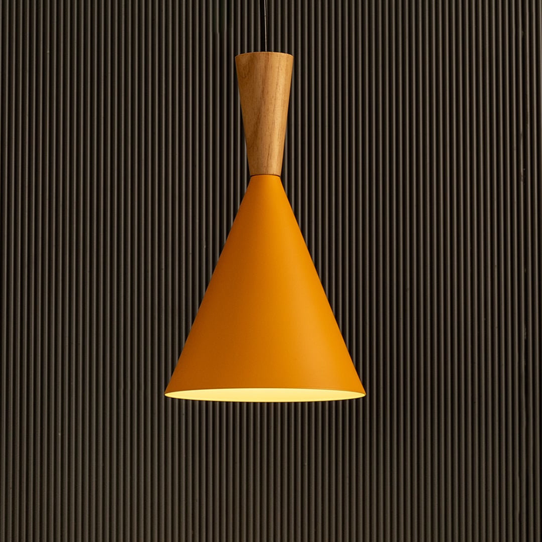 Mustard yellow metal cone pendant light with wooden detail shown on dark background adding bold modern ceiling decor style.
