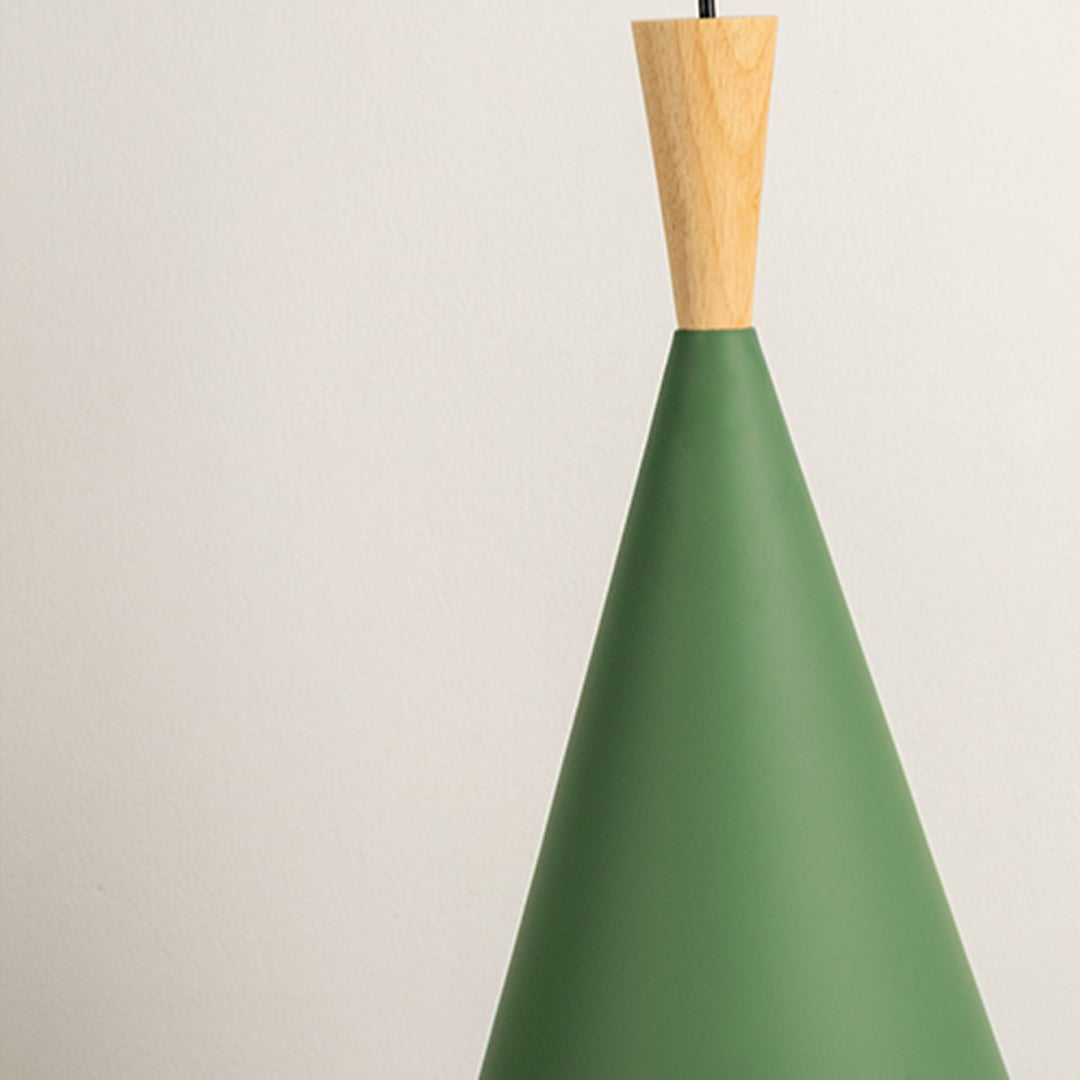 Closeup view of green cone pendant light with matte finish shade and natural wood detailing.