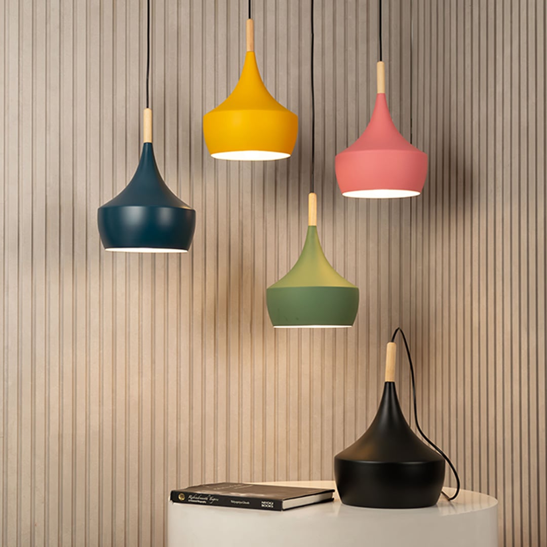 Stylish multi color pendant lighting cluster showcasing Scandinavian design for kitchen and dining interiors.