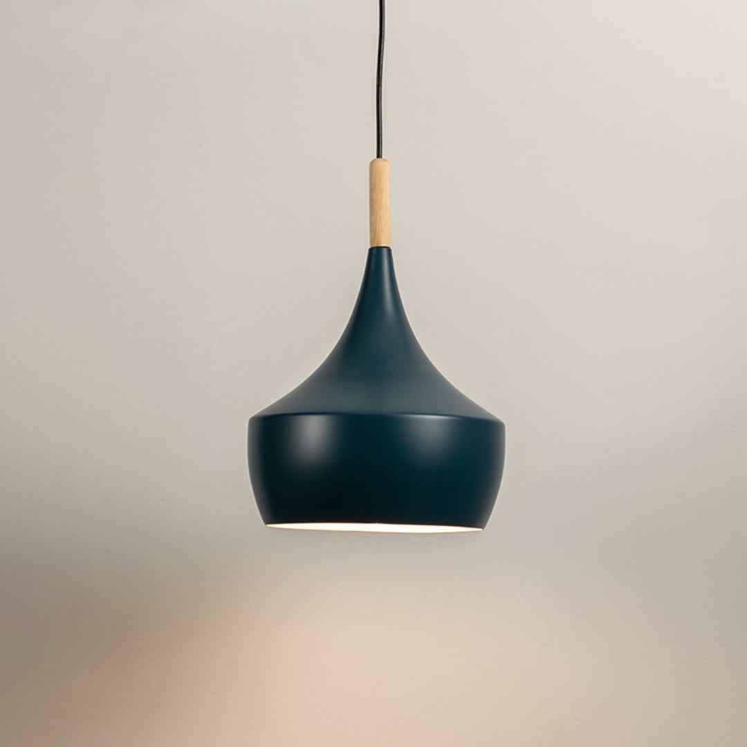 Colorful pendant light with soft illumination on a clean white background highlighting its design.