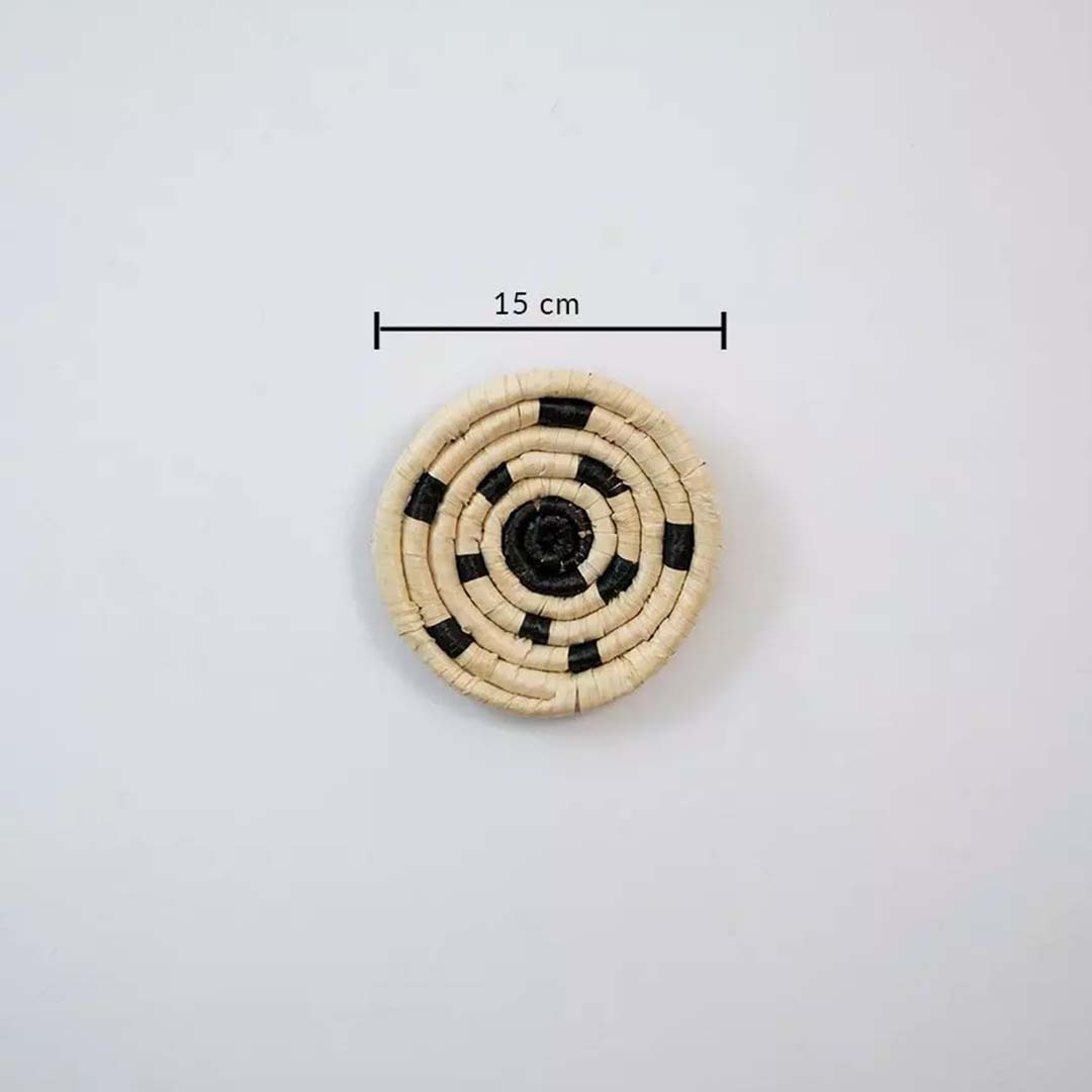 Small circular woven wall basket in natural and black tones showing 15 cm diameter ideal for compact wall decor styling.