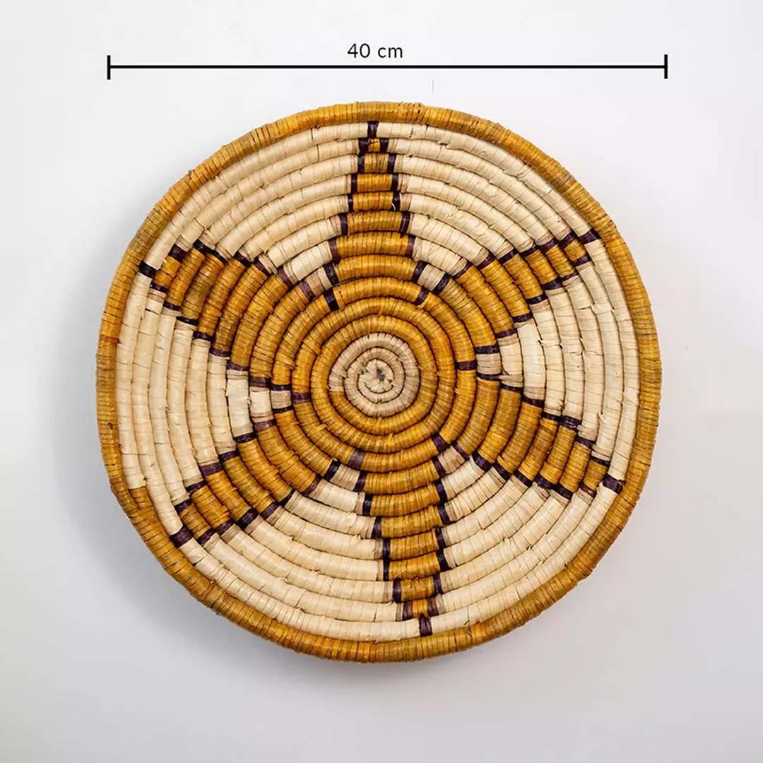 Woven basket wall decor with 40 cm diameter shown with dimensions handmade cane design ideal for boho interiors.