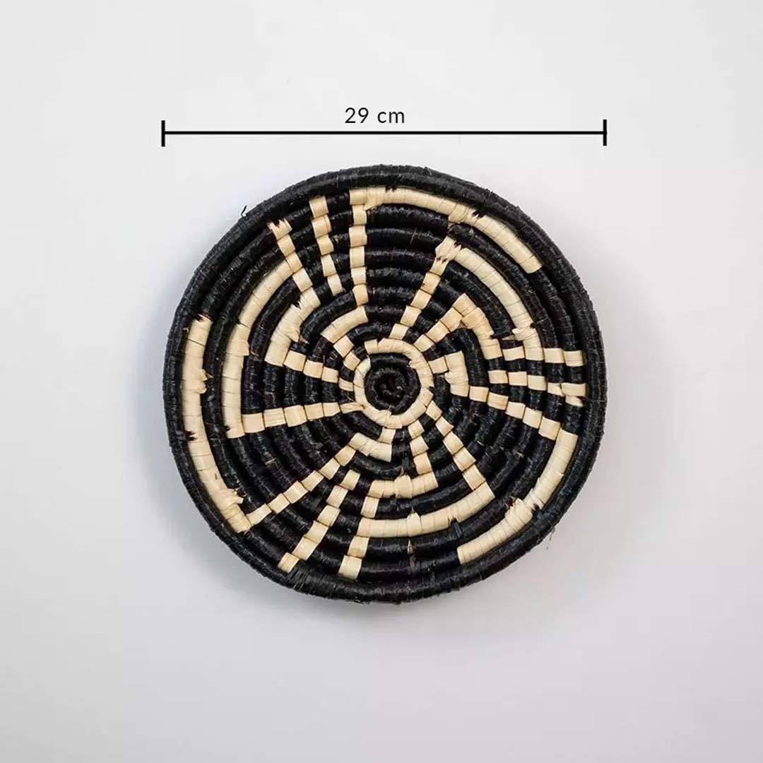 Handwoven round wall basket in black and natural fiber showing 30 cm diameter suitable for decorative interior wall placement.