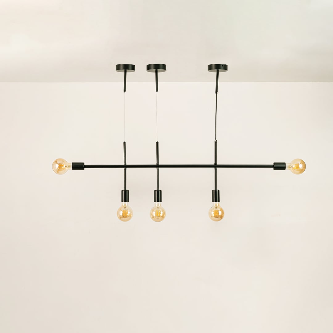 Black metal linear chandelier on a white background with lights off highlighting its elegant minimal silhouette.