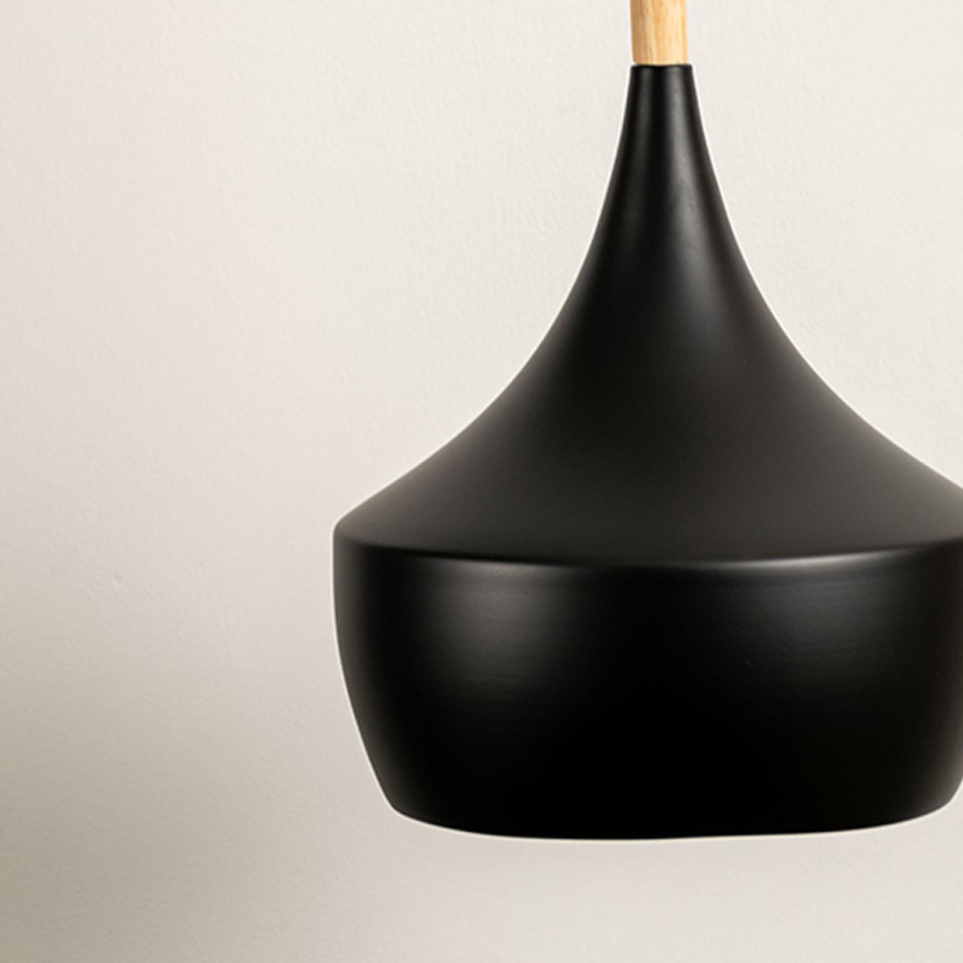 Black metal pendant light with smooth rounded shade and wooden top displayed on white background for modern ceiling lighting decor.