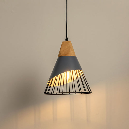 Pendant light with a wooden accent and black wire cage glowing softly against a white background emphasizing its modern design.