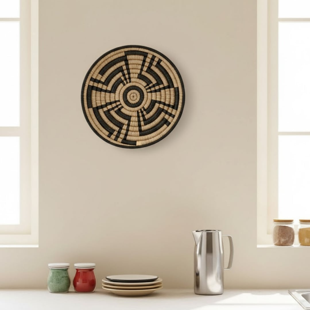 Round woven wall basket displayed above kitchen counter adding handcrafted pattern and warm texture to interior home Decor.