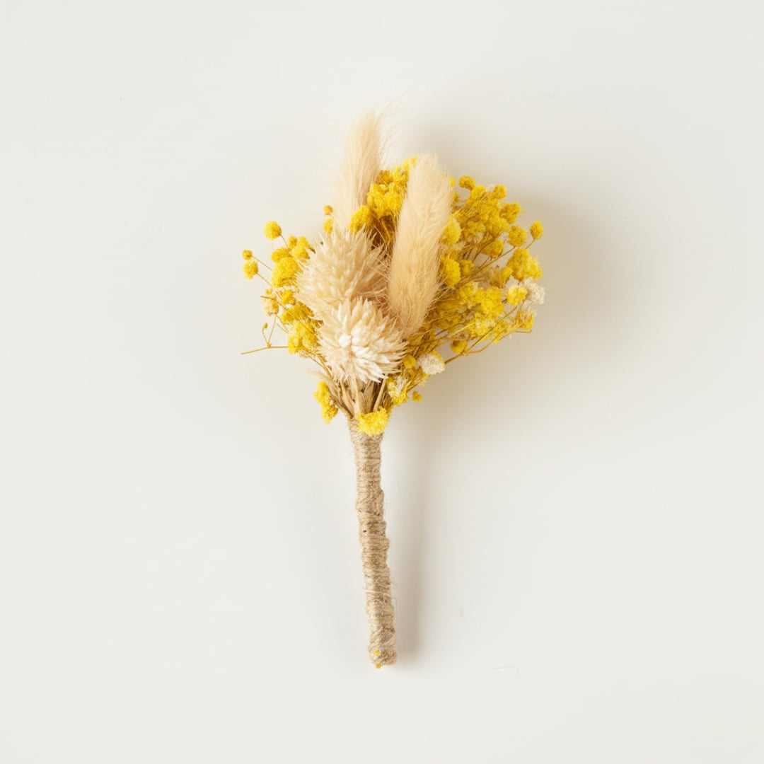 Dried floral stem bouquet with yellow blooms soft pampas and ivory accents on white background highlighting cheerful texture handcrafted elegance and decor styling appeal.